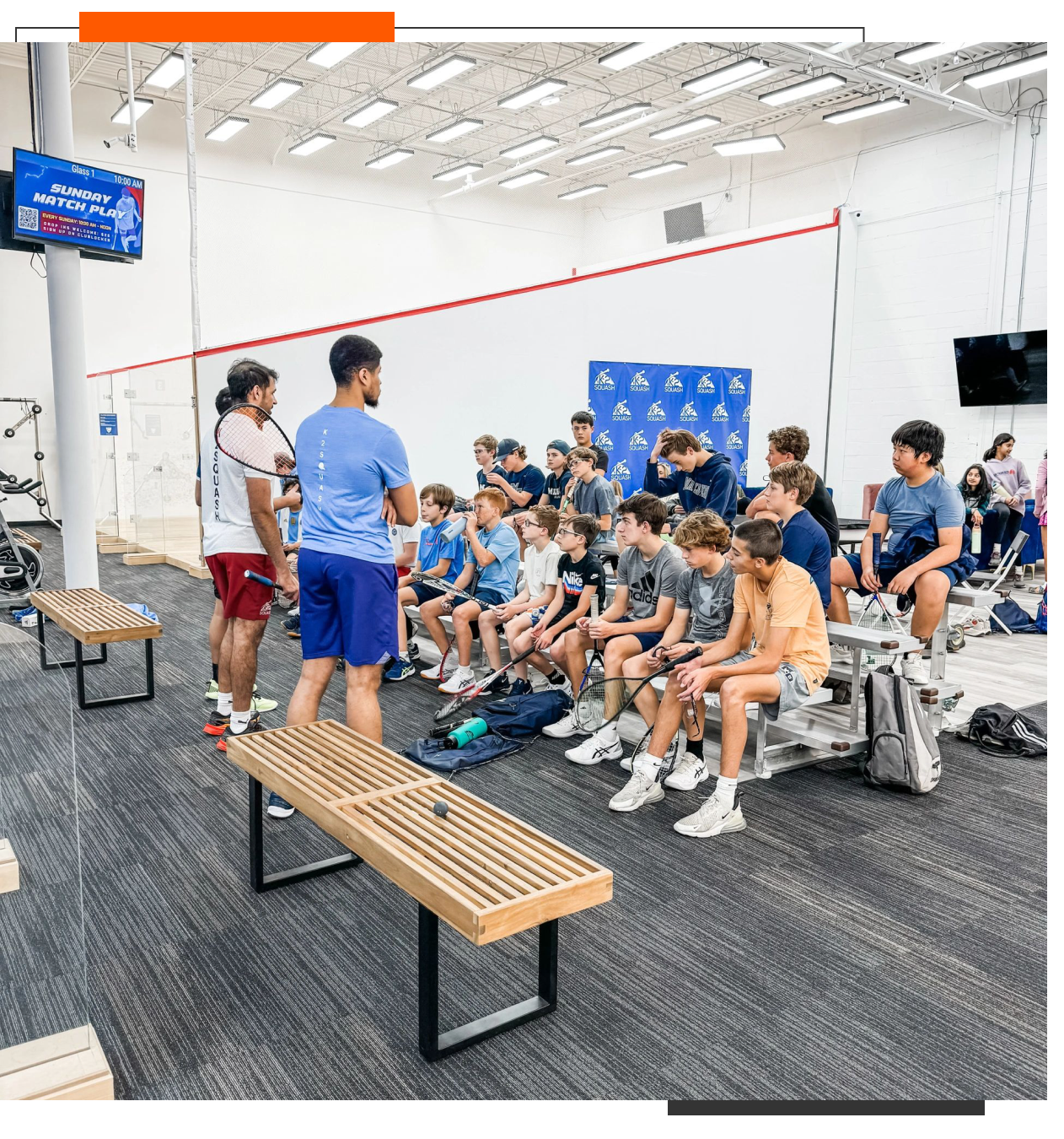 Group of people in a sports facility.